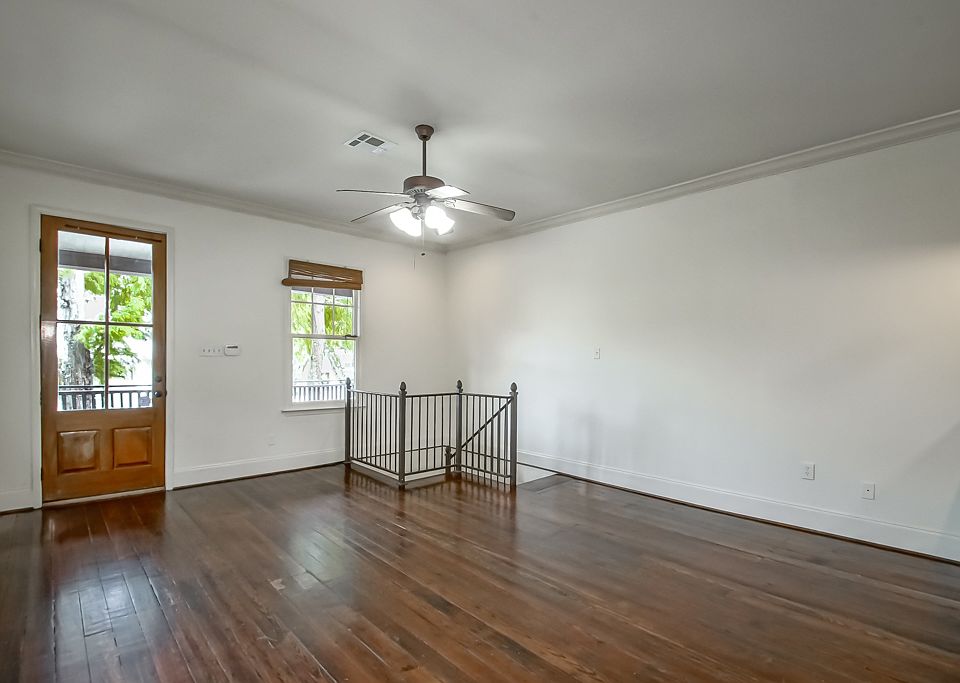 Stairwell leads to private 1st floor suite