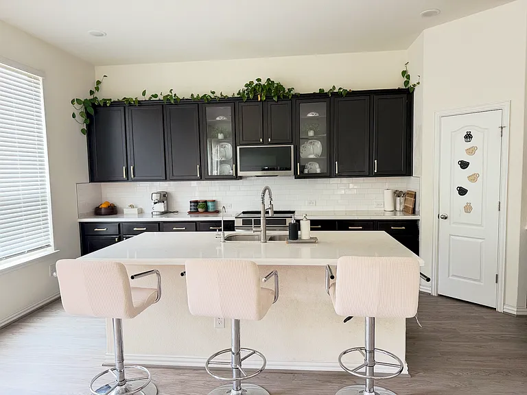 Large kitchen with island and modern cabinets