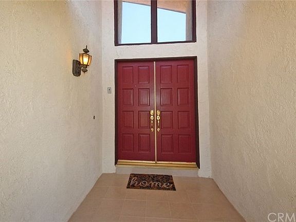 Covered entryway with double doors