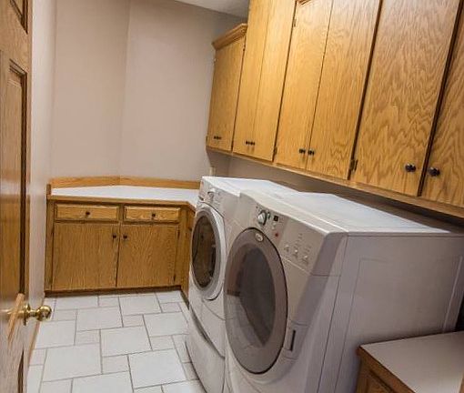 Main floor laundry w/shoot