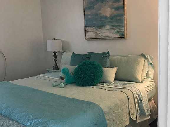 Very comfortable King size bed and there is a TV on the wall