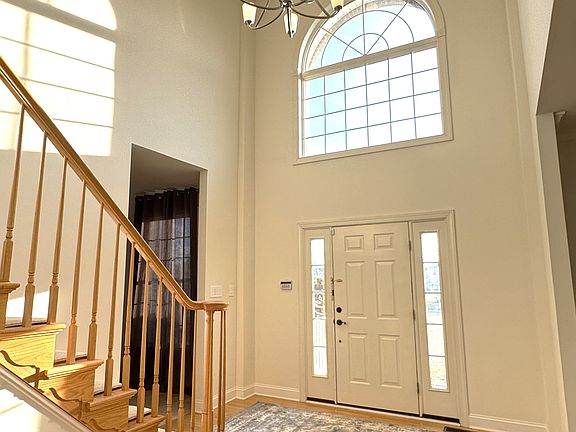 Two story foyer and clerestory window allows for a bright and spacious entry