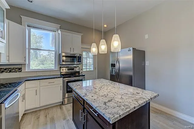5779 Pershing Ave — Photo 25