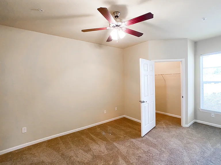 Large Bedroom with Lush Carpet and Walk in Closet Large Bedroom with Lush Carpet and Walk in Closet