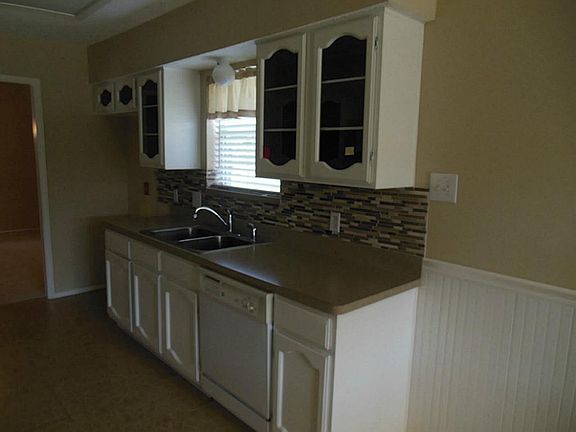 Kitchen with unique glass cabinet doors