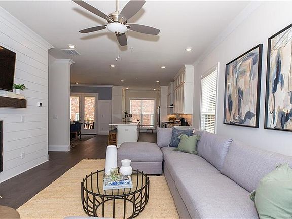 A picture perfect masterpiece - Photo is not of actual townhome. Representative purposes only.