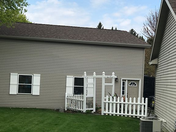 Side of house and barn 