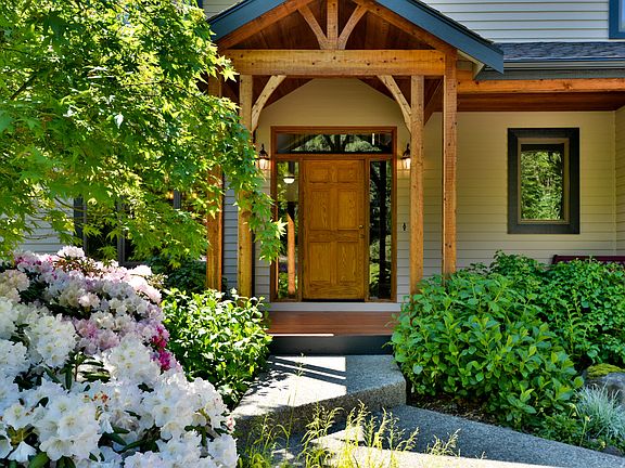 Beamed covered front porch