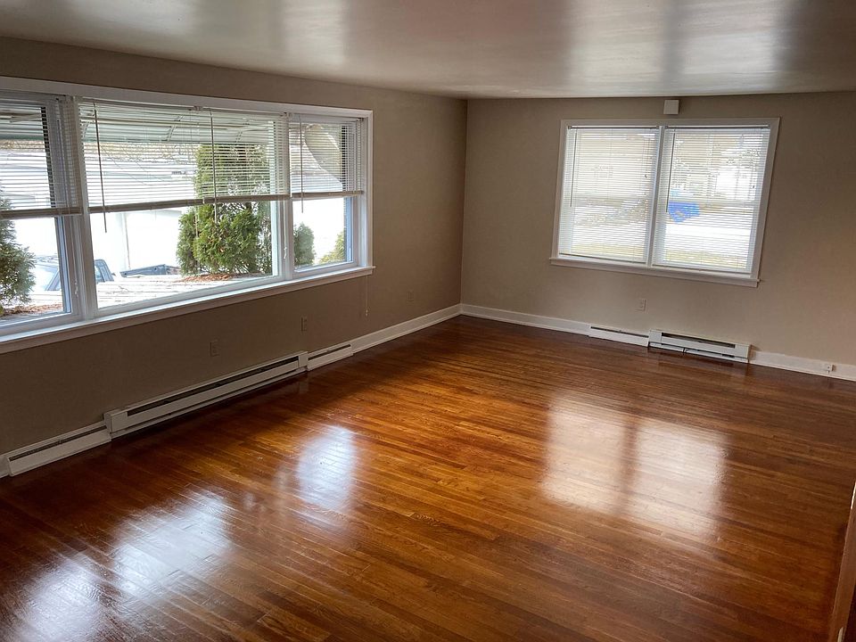 Living Room, Hardwood Floors, All New Windows!