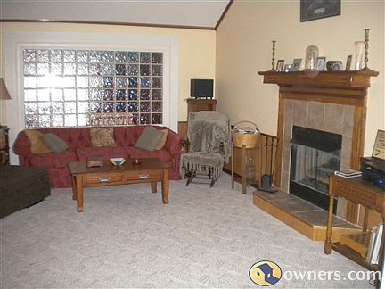greatroom with gas logs & glassblock wall