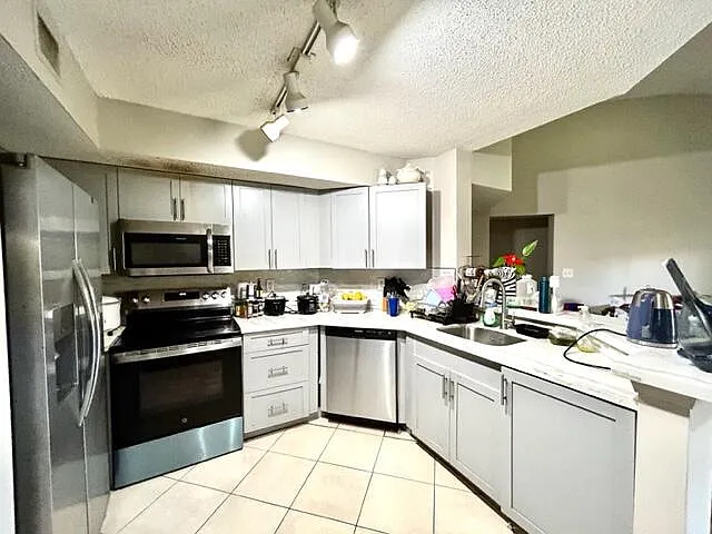 741 N Pine Island Rd #303 — Photo 10
