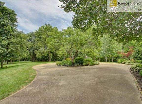 Landscaped Circle Drive adds to the ambiance.