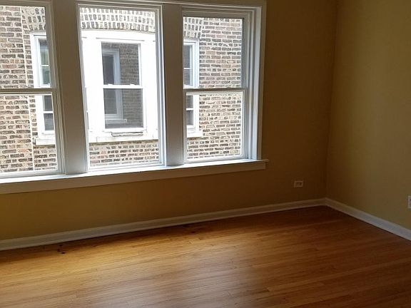 5th image of 1126 E 81st Pl #3