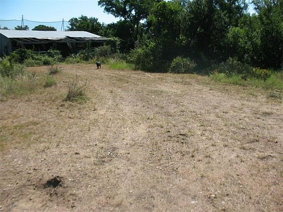 Driveway entrance to old barn/stable
