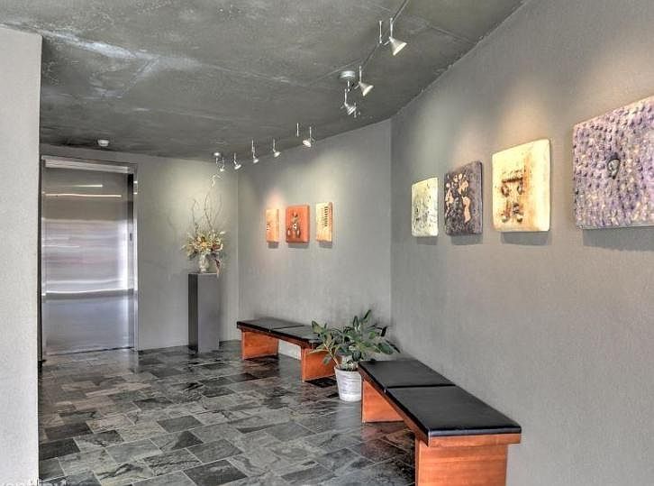 Building Entry Foyer With Local Art and coded Elavtor