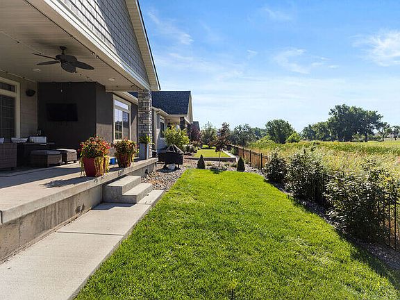 Private patio with yard