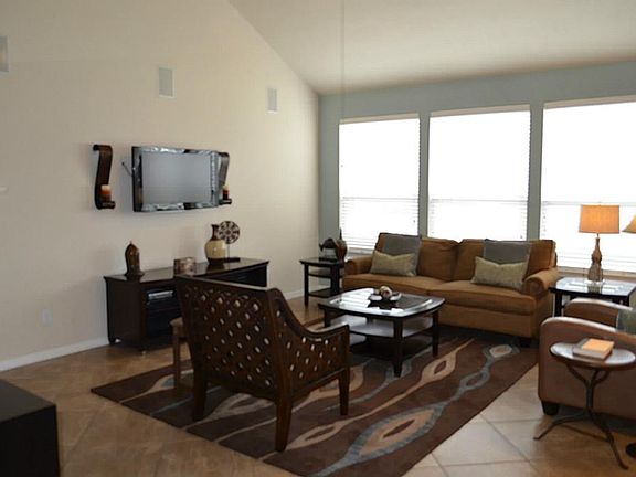 Immaculate family that is open to the kitchen  and breakfast area.