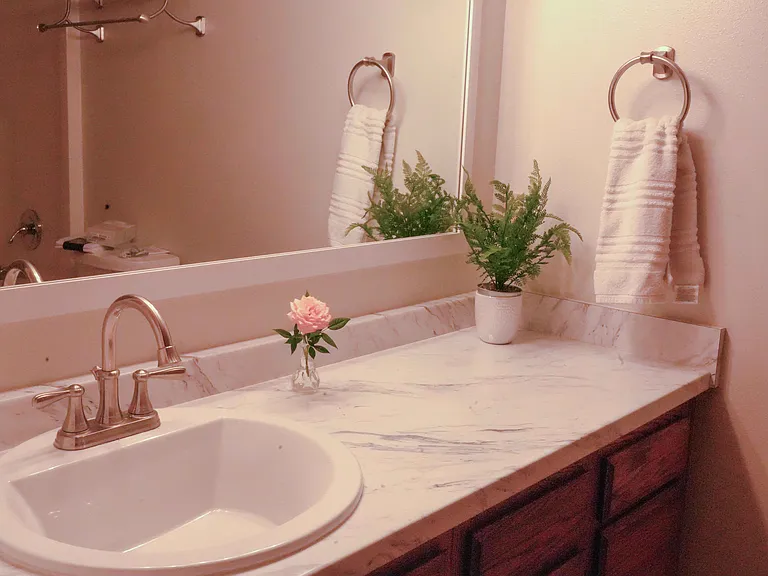 Bathroom with bathtub and shower