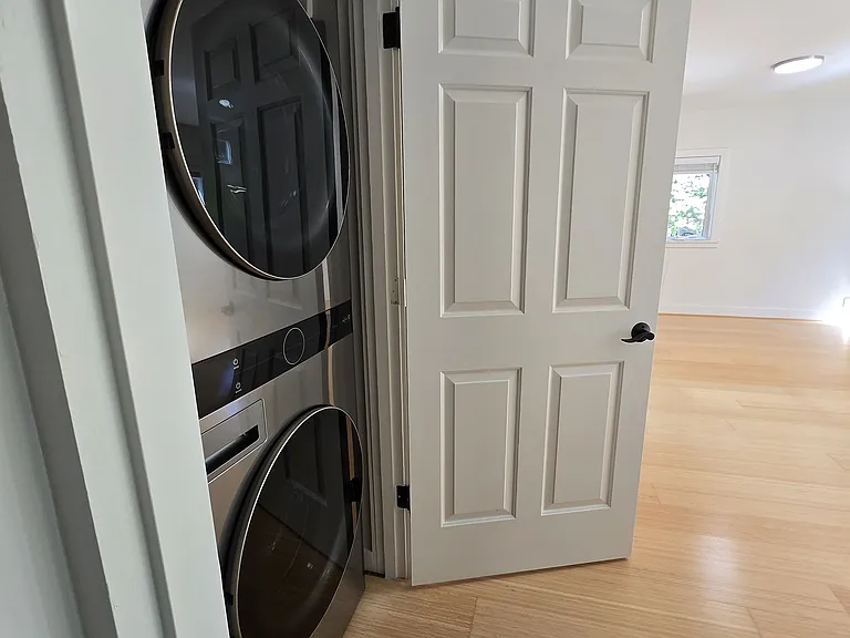 Brand new washer and dryer conveniently tucked into a closet. Dryer is vented to outside.