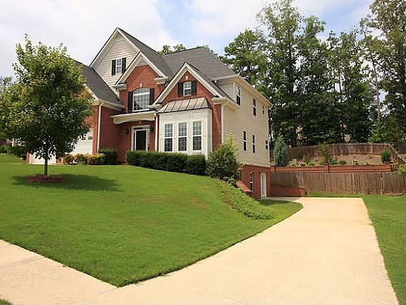 2nd driveway provides plenty of off street parking and access to terrace level