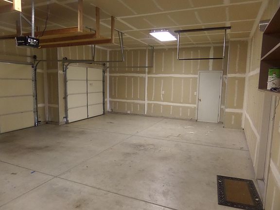 Three car garage (with pull-up bar & overhead storage)