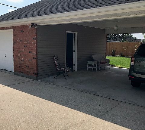 Attached carport and garage