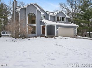 10100 Deer Creek Dr SE, Ada, MI 49301