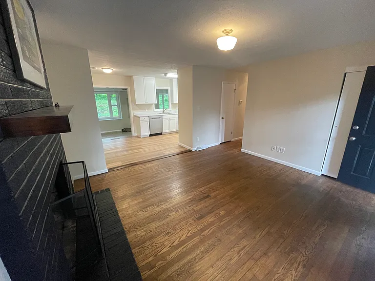 Entry/Living room looking into kitchen/dining area and Rec. room