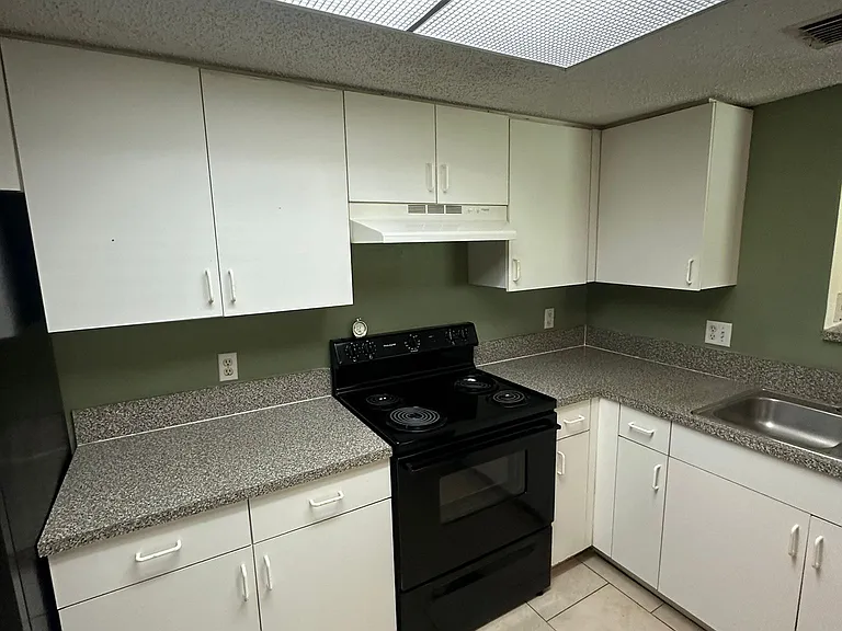 5005 Wiles Rd — Photo 24