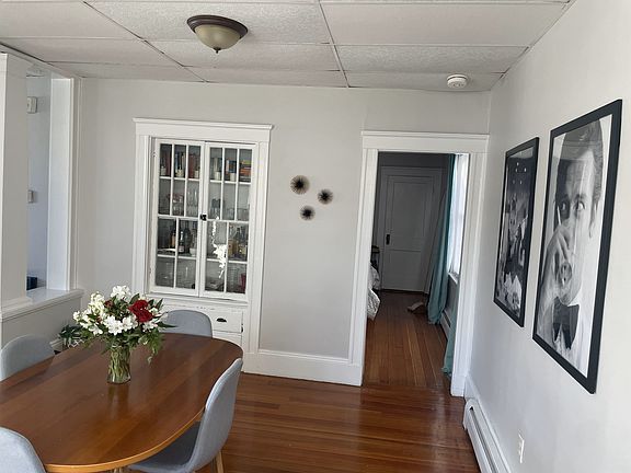 Classic built-in cabinet in Dining Room. Doorway to Bedroom.