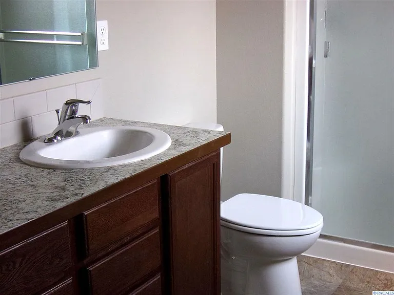 Primary Bathroom (includes double sinks, walk-in shower)