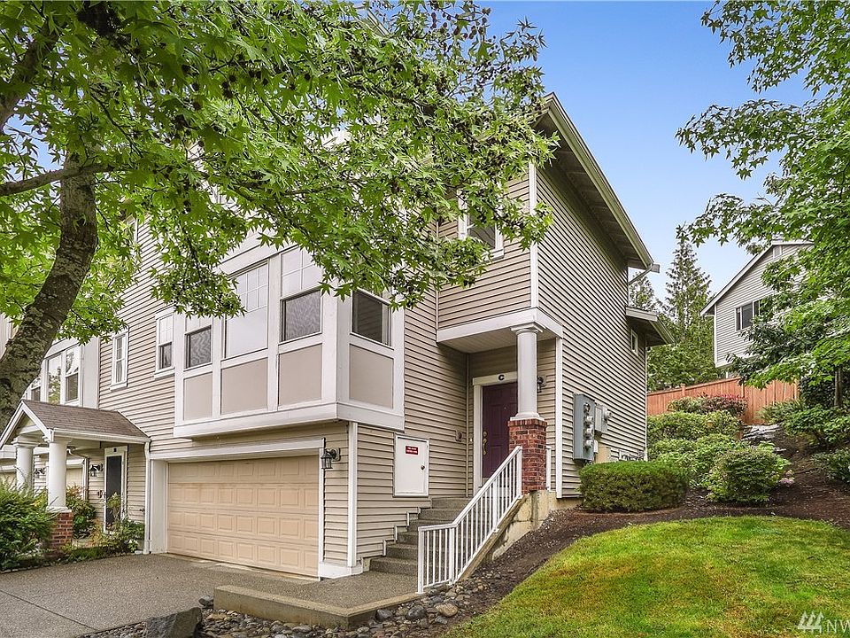 Unit C offers a private end unit Home, Side yard space and lovely PNW trees and landscape design. 