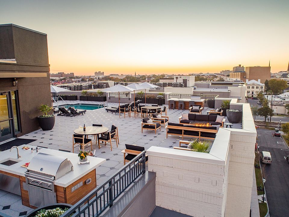 Rooftop amenities include a pool, outdoor kitchens, firepit and spacious sundeck