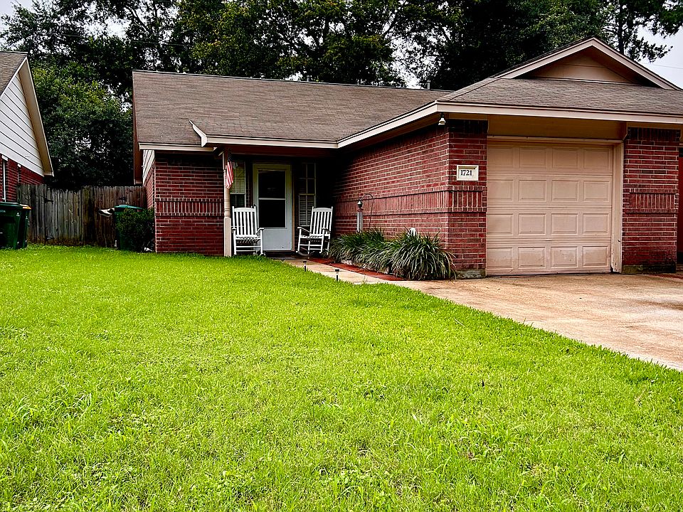 Welcome home 1721 is the townhome on the left of the property. The long driveway, manicured lawn & inviting front porch welcome you home __
