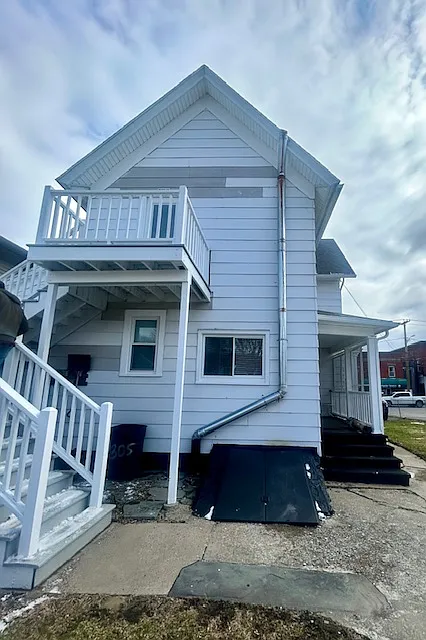 Rear view. Upper exterior entrance.