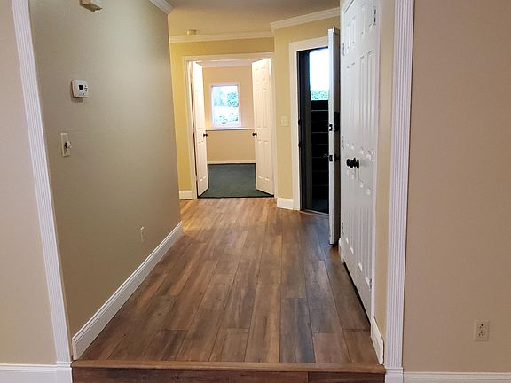 Foyer goes to 2 bedrooms and 2 bathrooms