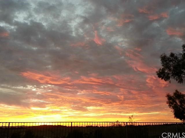 Gorgeous (sit down) views of the rolling hills and Sunsets from the yard, pool and home.