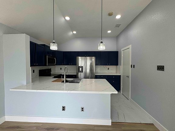 Kitchen with Counter Depth 3-Door French Door Refrigerator