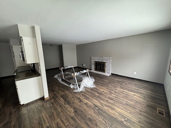 living room view from dinning room. New fireplace insert has been installed since this picture was taken.