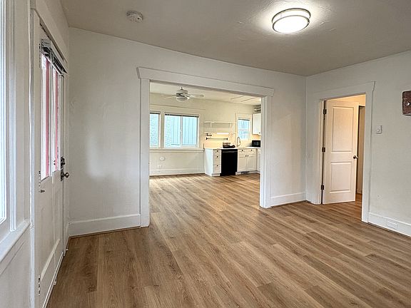 Living room looking into dining area.