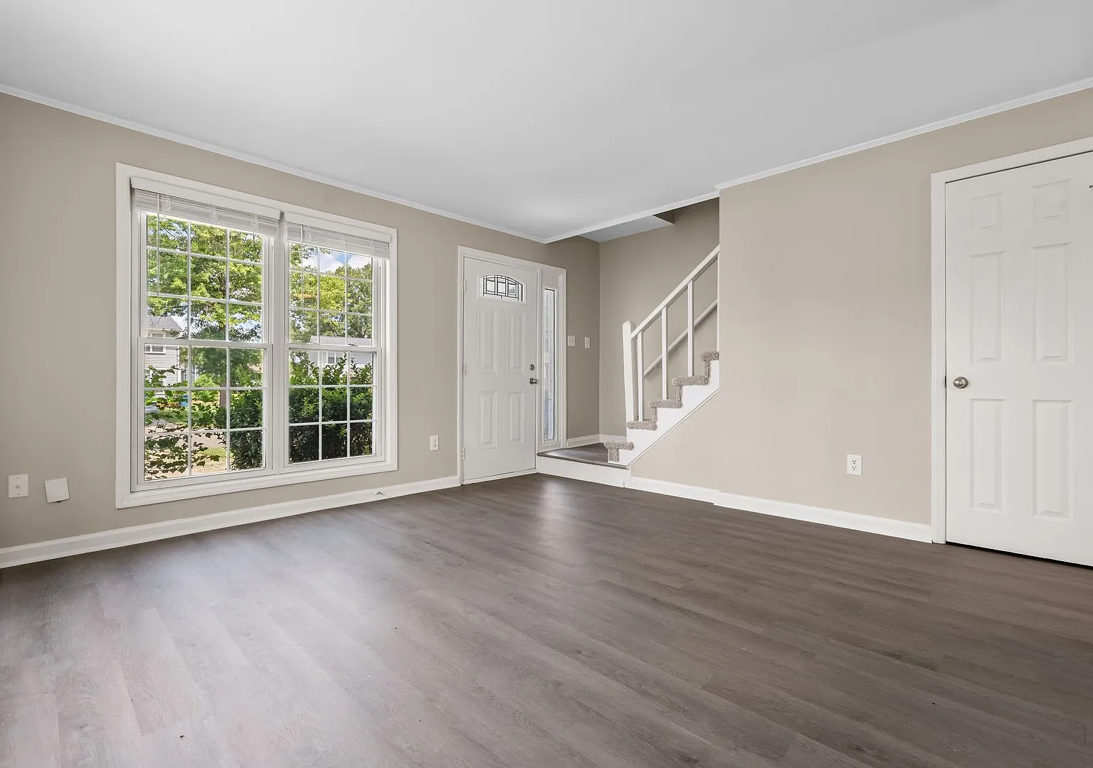 Discover this freshly renovated end-unit townhome in Durham, NC featuring 2 bedrooms and 1.5 baths. — Photo 2
