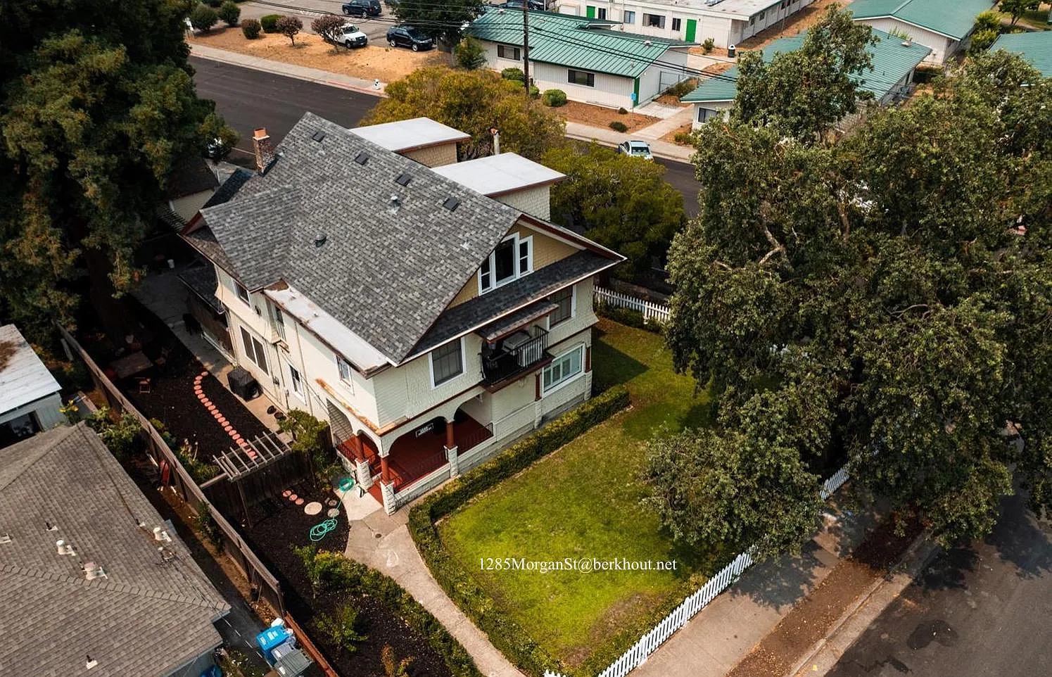 Unit 1 is on the first floor in front; you can see the kitchen window in this photo.
