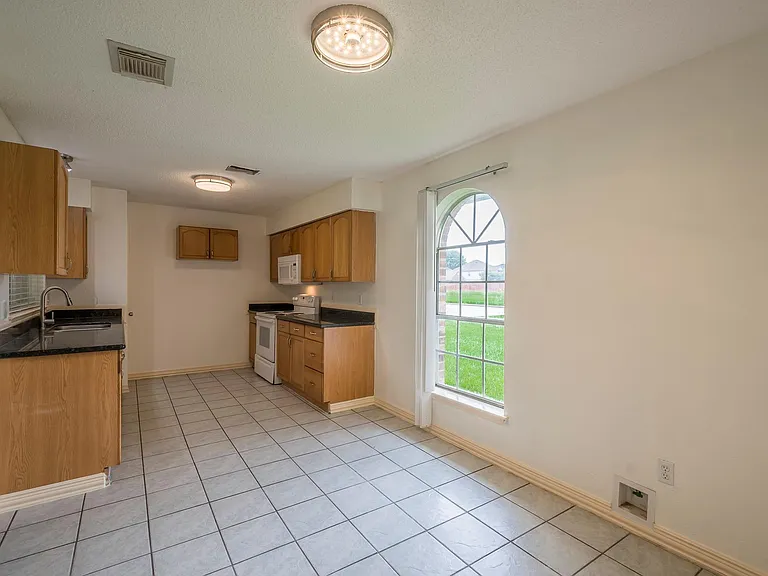 13402 T C Jester Blvd — Photo 2
