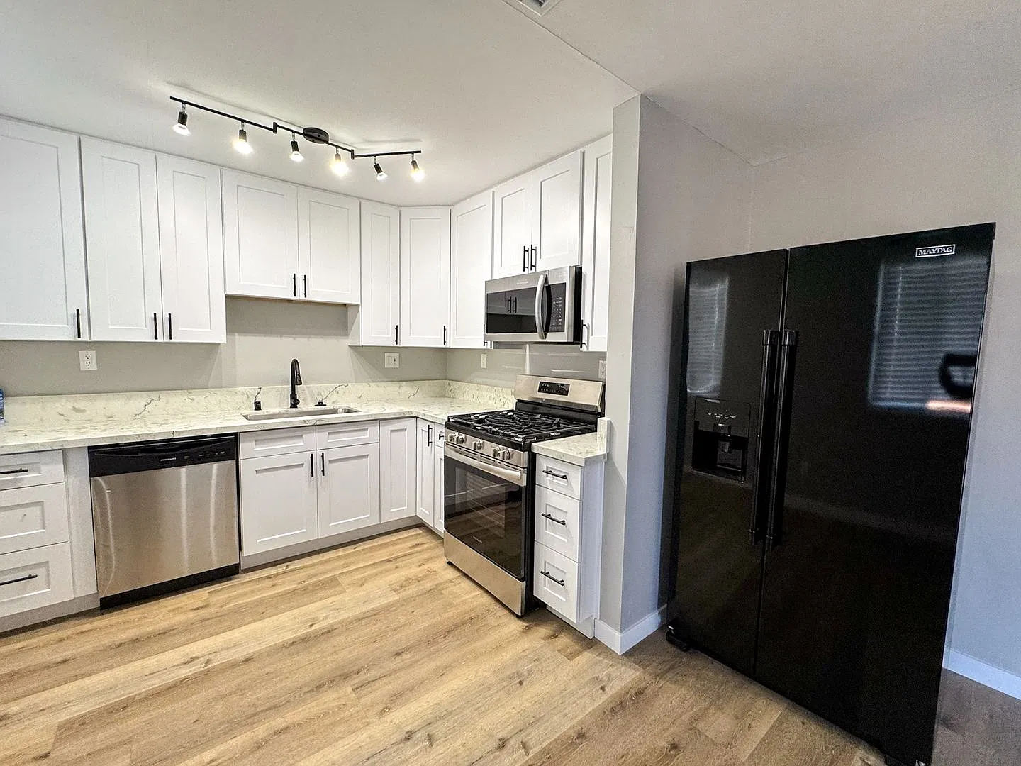 Updated 3 Bedroom, 2 Bath Home with Modern Features in a Prime Linda Vista Location — Photo 4
