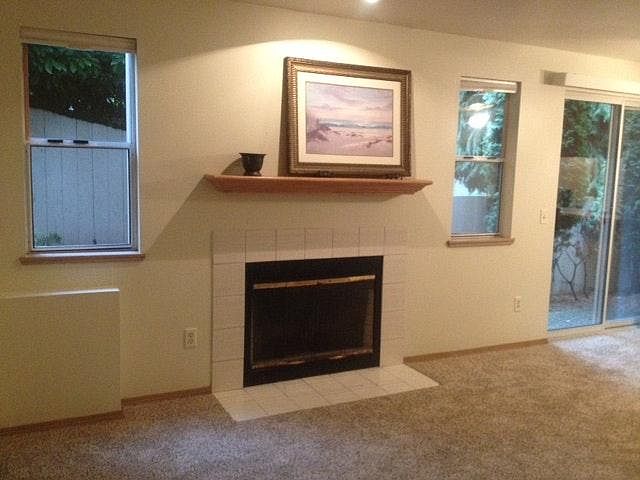 Living Room with Fireplace, new carpet