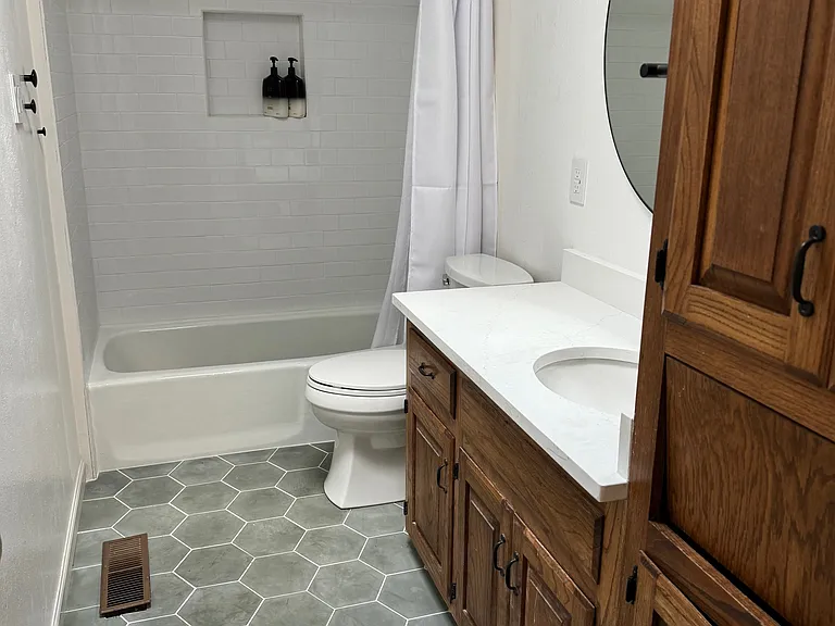 Guest Bathroom with New Quartz Countertops and Tile