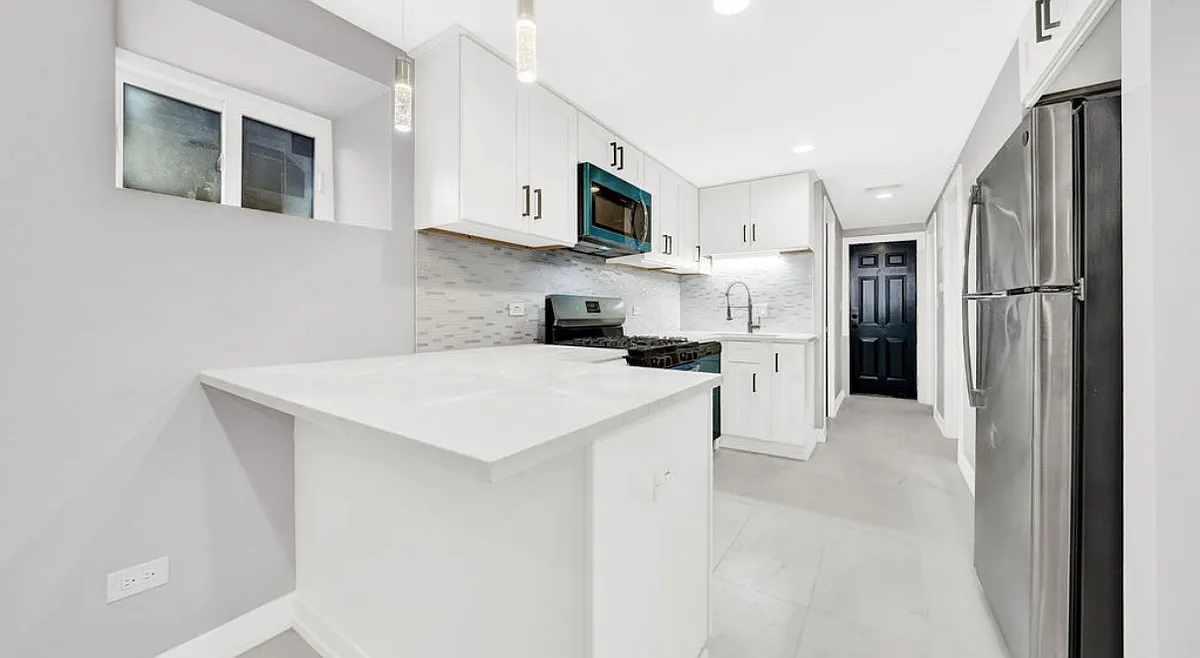 Building Photo - 2704 W 24th Pl #G