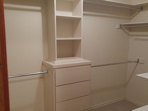 Master bedroom walk in closet