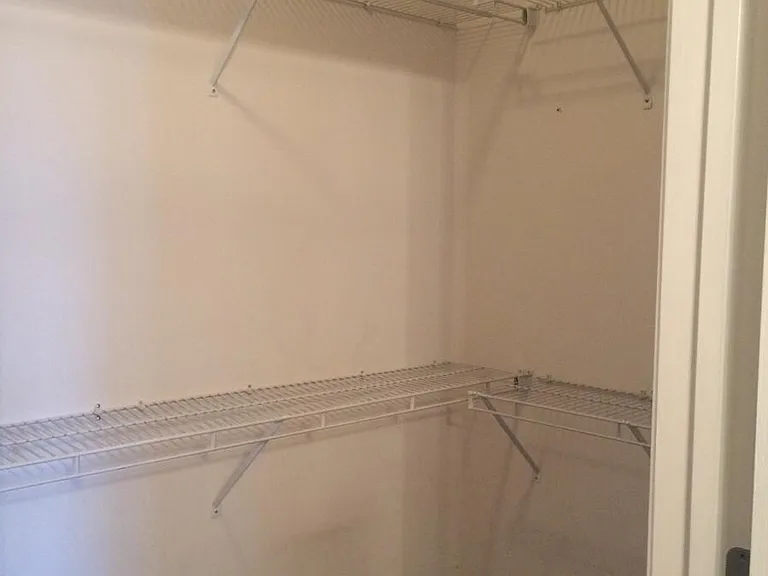 Huge walk-in closet attached to Master bedroom.