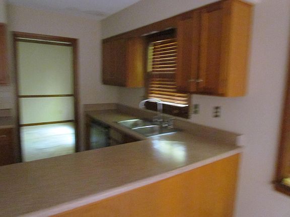 Open kitchen leading into the family room
